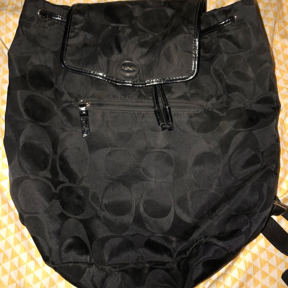 Coach black backpack.
